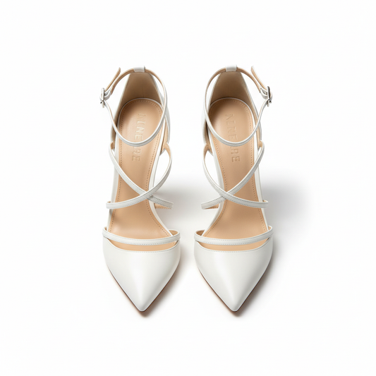 White strappy stiletto heels on white background